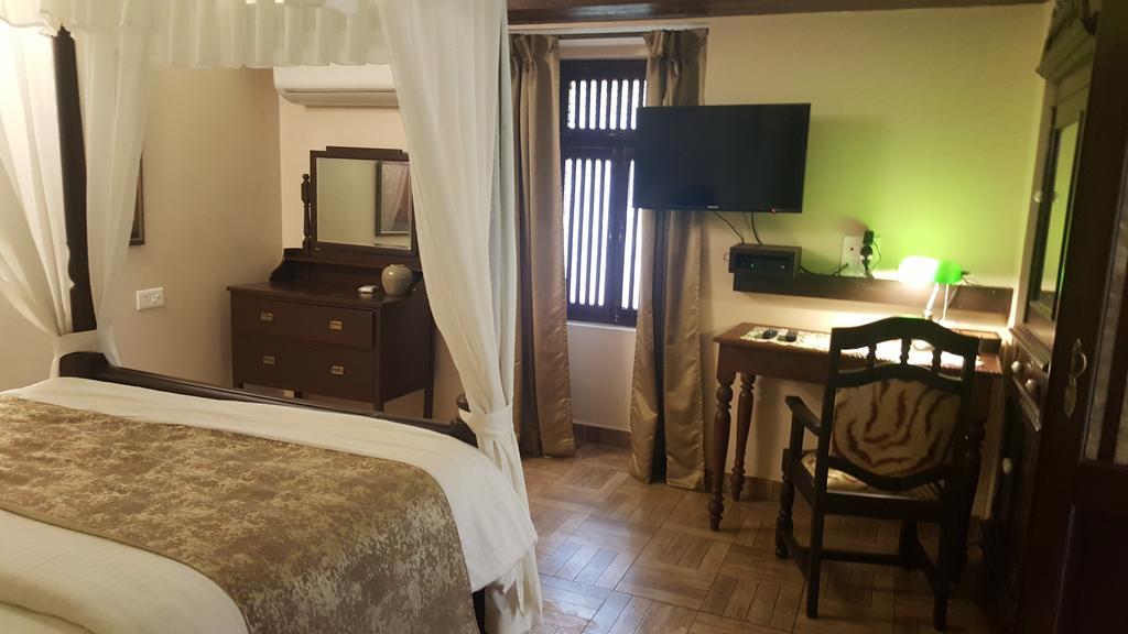 Casa Menezes - A Heritage Goan Homestay Bambolim Quarto foto
